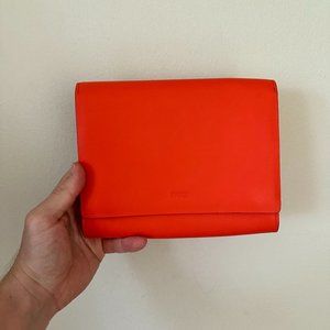 BAGGU Bright Orange Leather Clutch